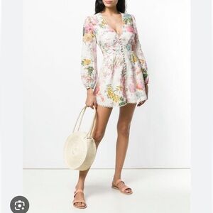 ZIMMERMANN
Heathers Plunging Floral Long-Sleeve Linen Romper
